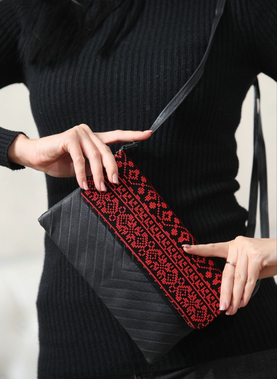 Black embroidered clutch bag sale